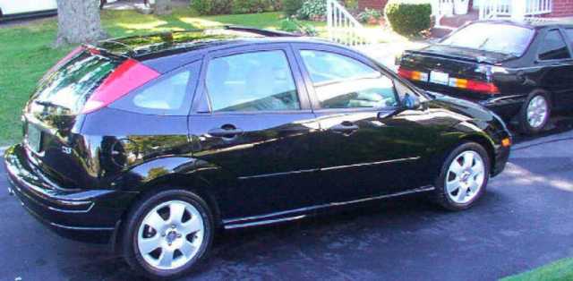 2002 Focus and 1992 Tempo GL Sport